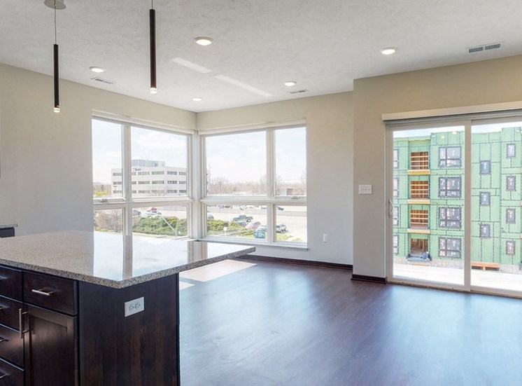 Open floor plan kitchen and living space in the Shine floor plan at Haven at Uptown in Lincoln, NE