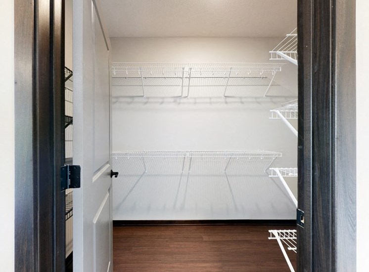 Master bedroom attached walk in closet provides plenty of extra storage space at Haven at Uptown in Lincoln, NE