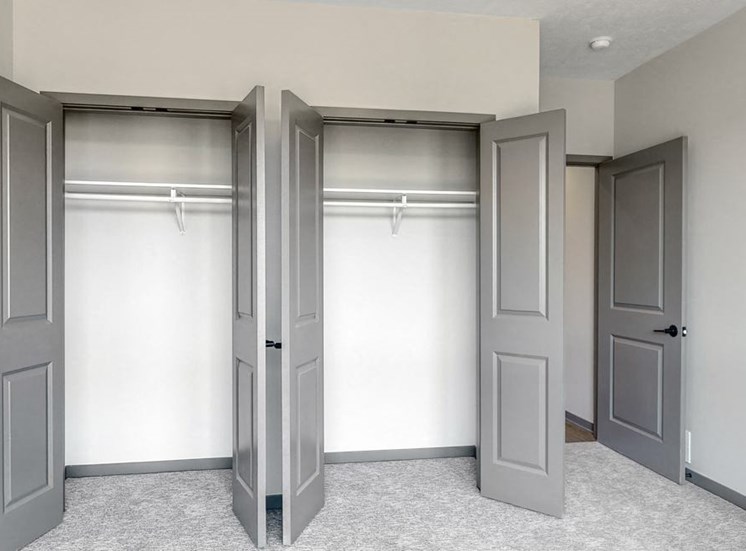 Double door closet in the second bedroom of the Shine floor plan at Haven at Uptown in Lincoln, NE