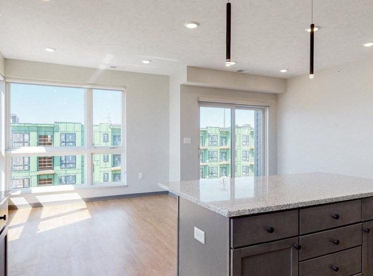 Island providing additional seating and storage space in the Shine floor plan at Haven at Uptown in Lincoln, NE