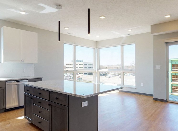 Open concept kitchen and living-dining space in the Shine floor plan at Haven at Uptown in Lincoln, NE