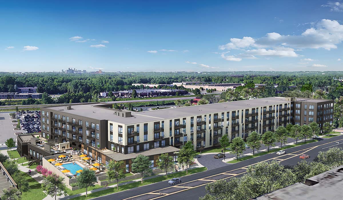 Exterior building rendering Aerial view of The Rowan apartments in Eagan, Minnesota including swimming pool, lush trees and surrounding metro area.