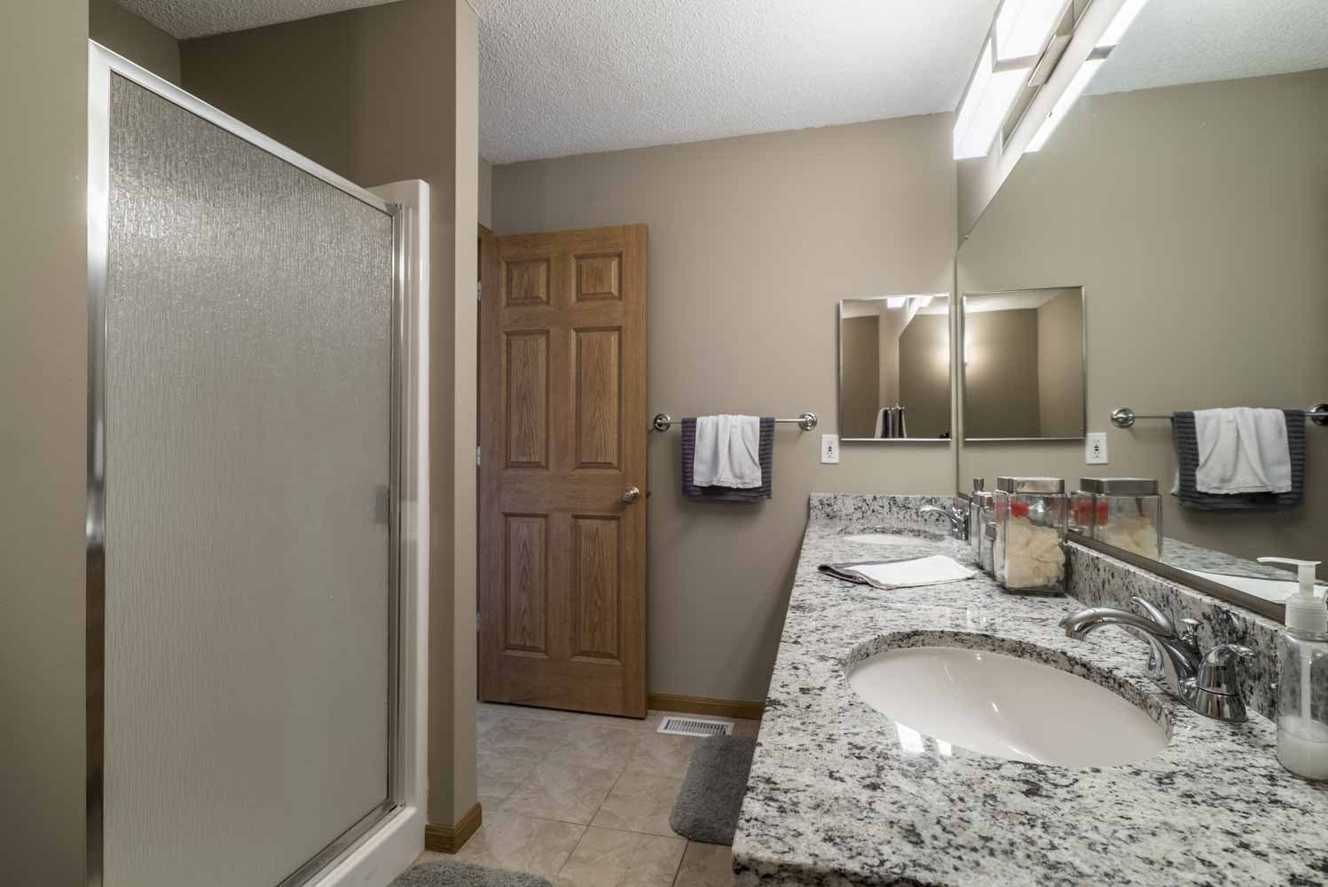 Master bath with shower and tub at at Southwind Villas in southwest Omaha in La Vista, NE, 68128