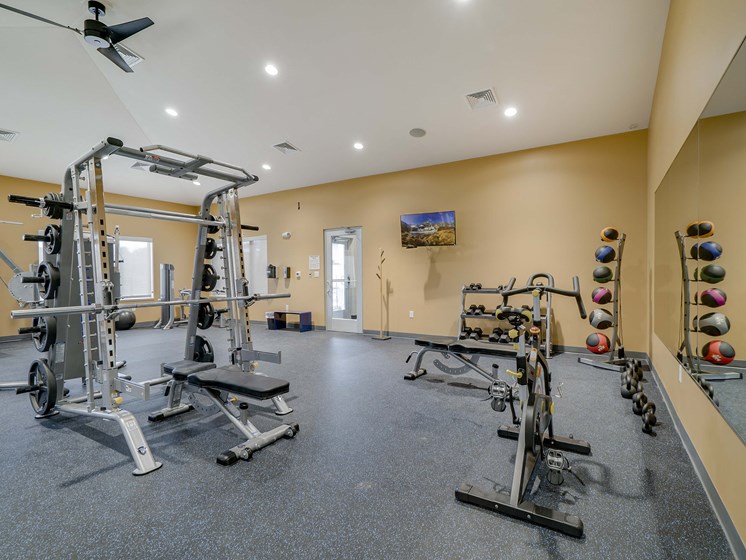 Weight lifting equipment in the fitness center at The Flats at Shadow Creek