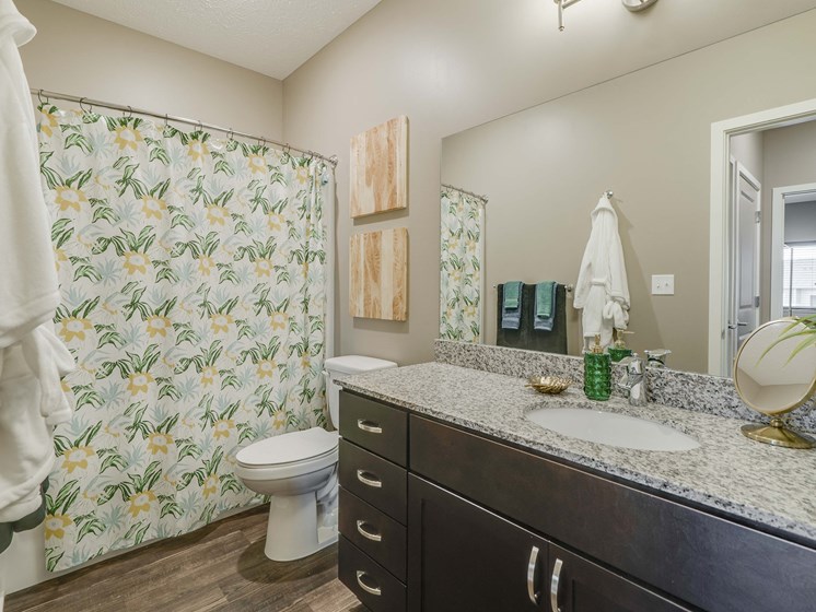 Large bathroom with granite countertop at The Flats at Shadow Creek new luxury apartments in east Lincoln NE 68520