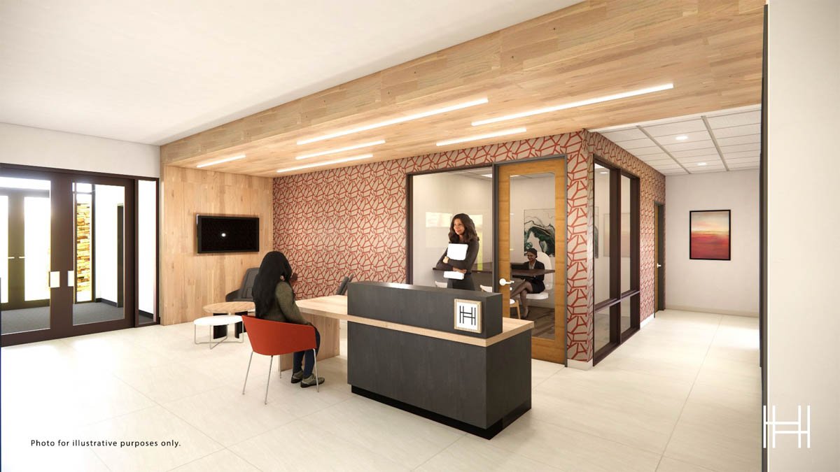 Rendering of apartment lobby with desk and office with glass walls