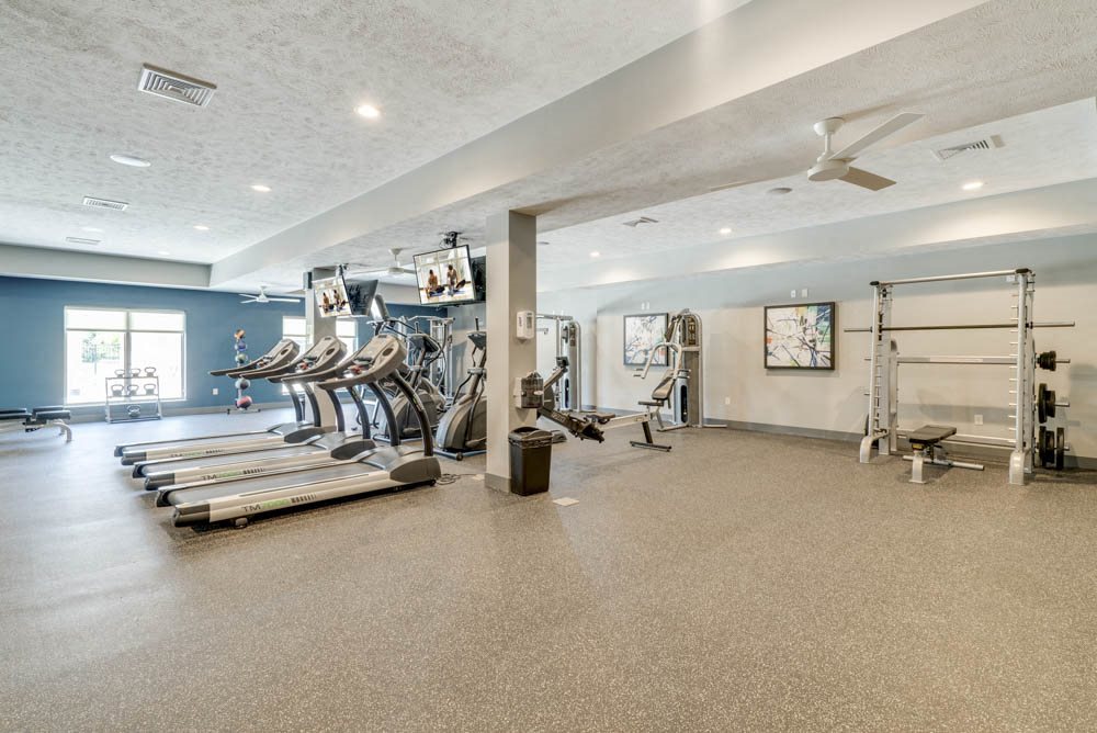 Large fitness center with a variety of equipment at The Villas at Mahoney Park