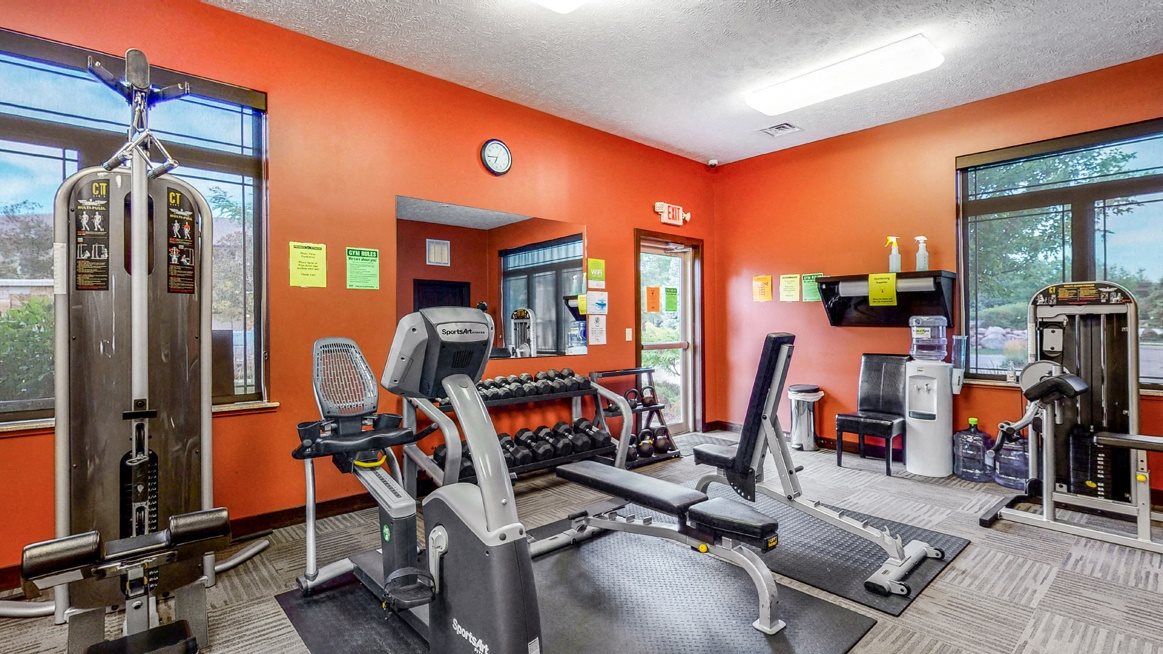 Expansive fitness room with modern equipment at The Villas at Wilderness Ridge luxury apartments in southwest Lincoln NE 68512