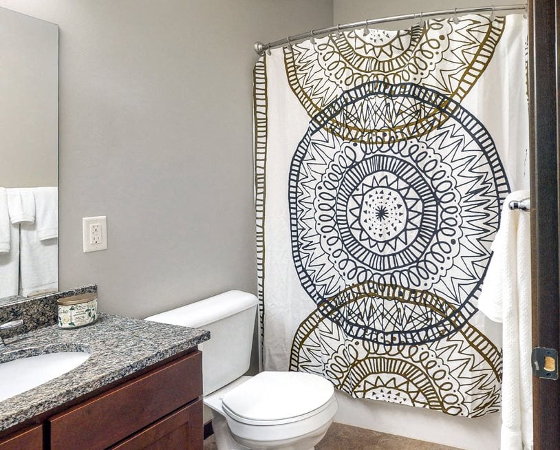 This full bathroom with tub/shower combo is available in the Cedar floor plan at the Villas at Wilderness Ridge