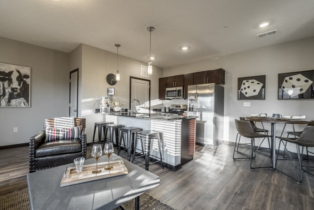 Open floor plan living room and kitchen at The Villas at Mahoney Park