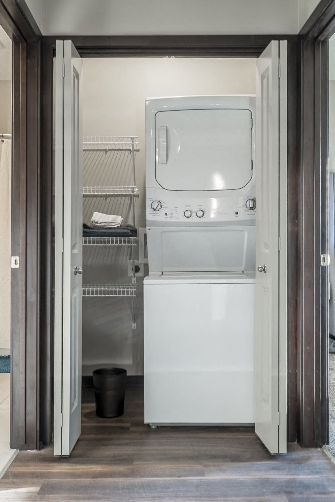 Stackable or full size washer and dryer included in unit at The Villa at Mahoney Park
