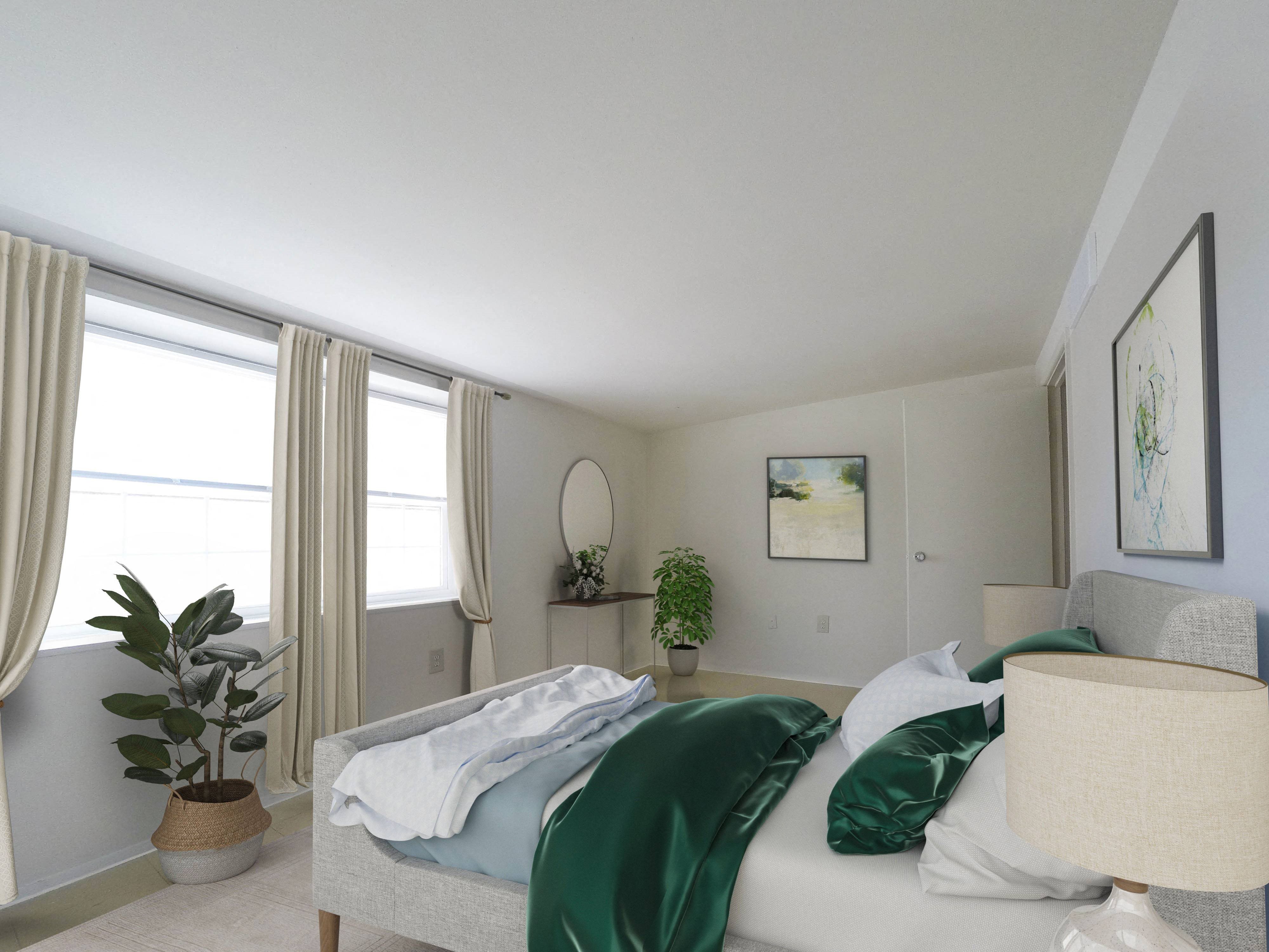 bedroom with well-lit, large windows