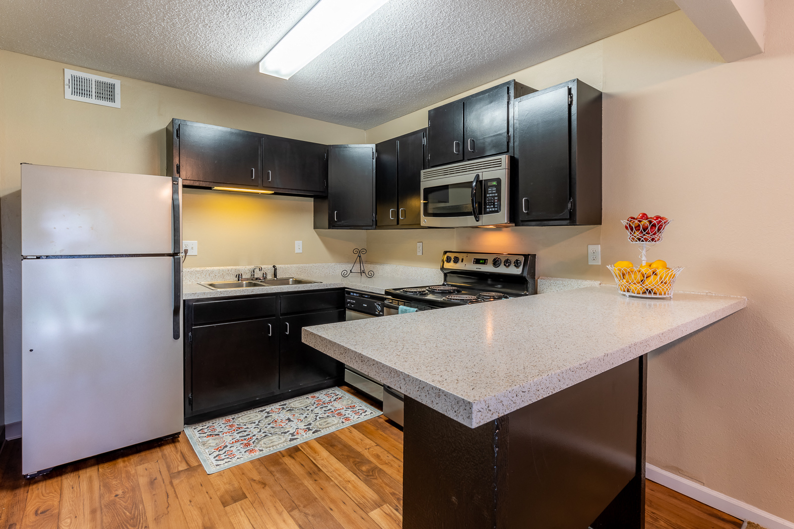 Kitchen with appliancesat Preston Court Apartments, Kansas