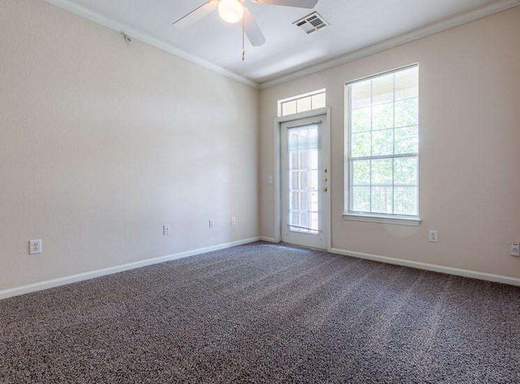 Carpeted Bedroom at Crowne Chase Apartment Homes, Overland Park
