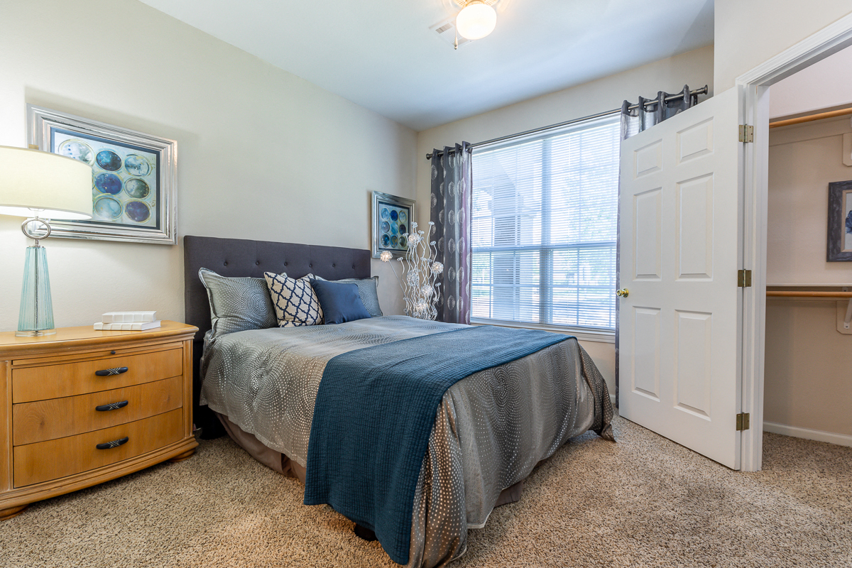 Bedroom With Closet at Crowne Chase Apartment Homes, Overland Park, KS