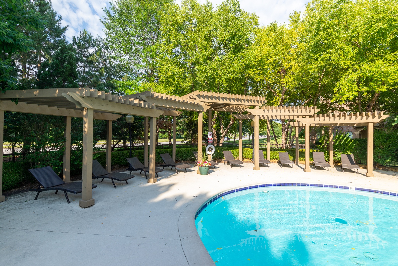 Extensive Resort Inspired Pool Deck at Crowne Chase Apartment Homes, Overland Park, Kansas