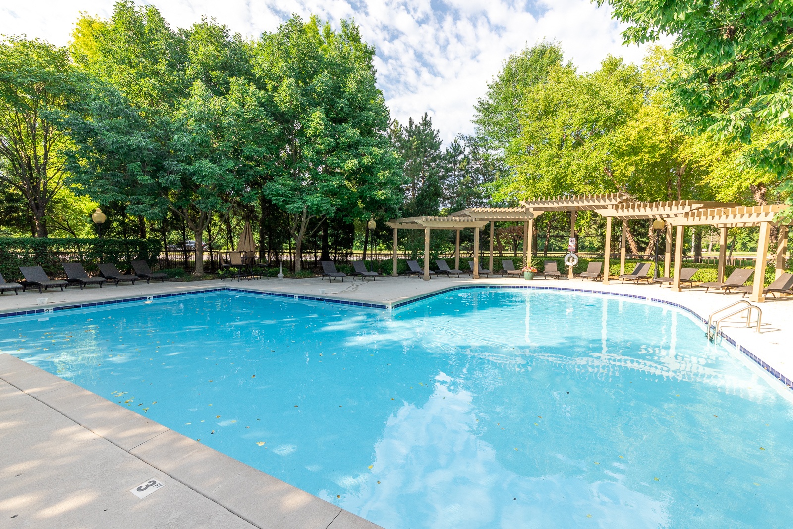 Pristine swimming pool at Crowne Chase Apartment Homes, Overland Park