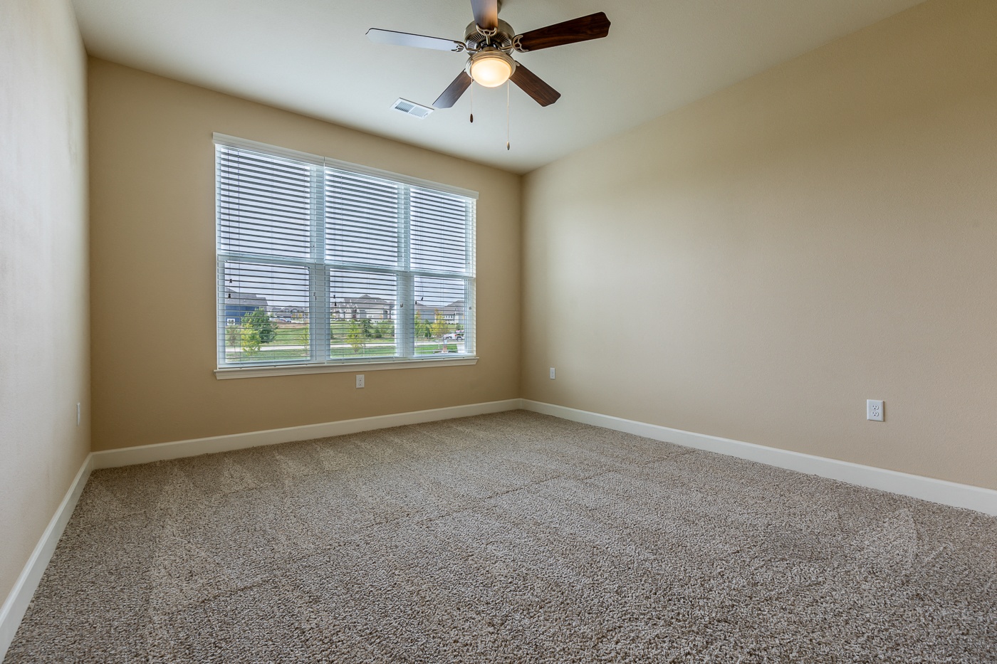 Carpeted Bedroom at The Residences at Bluhawk Apartments, Overland Park, Kansas