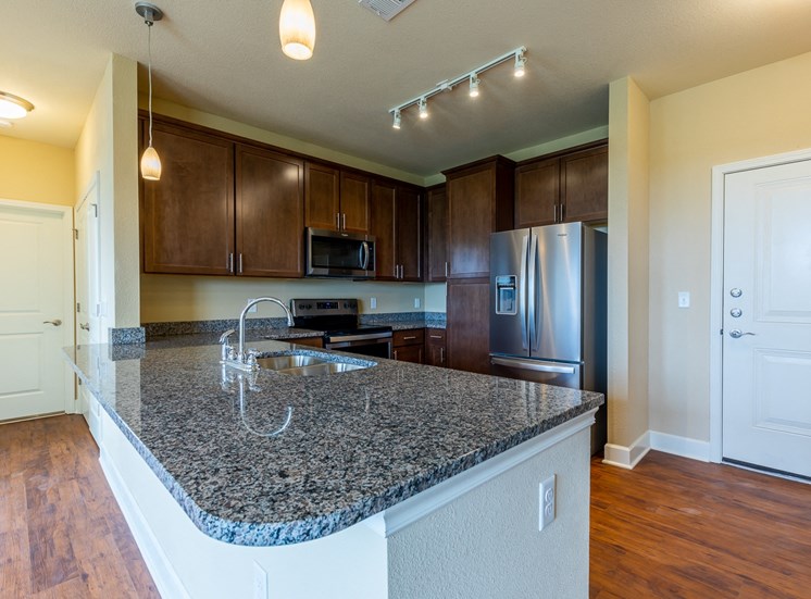 Granite Counter Tops at The Residences at Bluhawk Apartments, Overland Park, 66085
