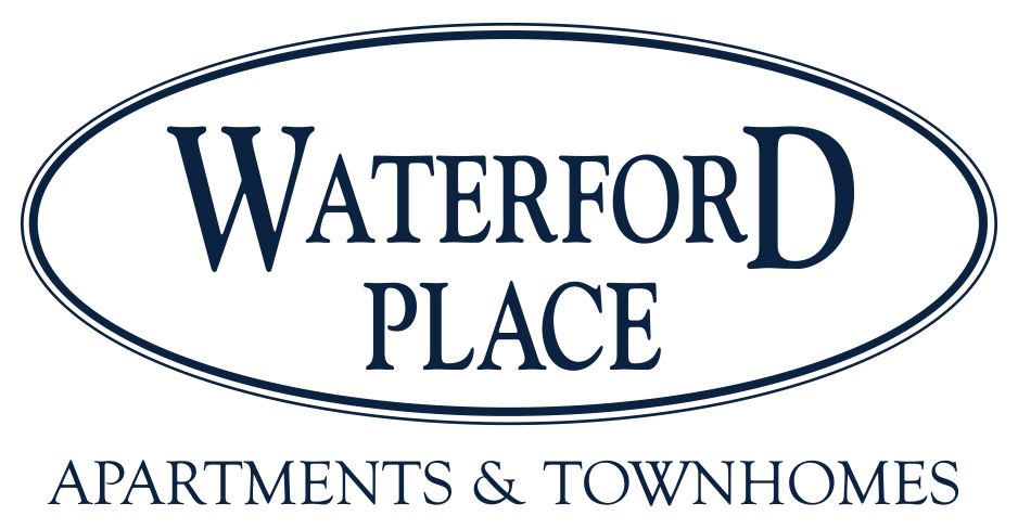the logo for waterford place apartments and townhomes