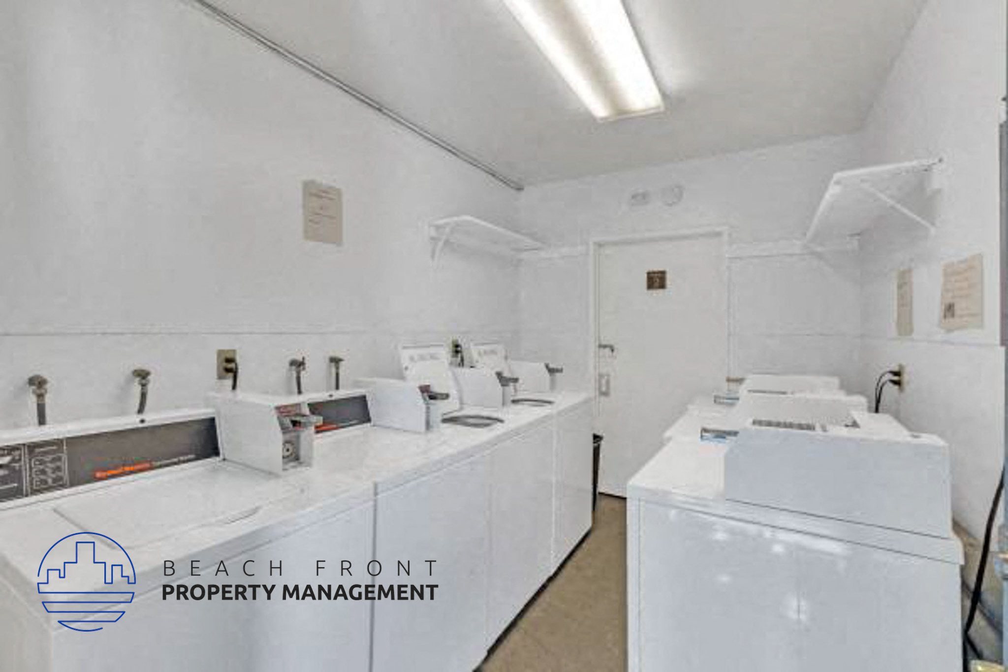 an image of a laundry room with sinks and washing machines