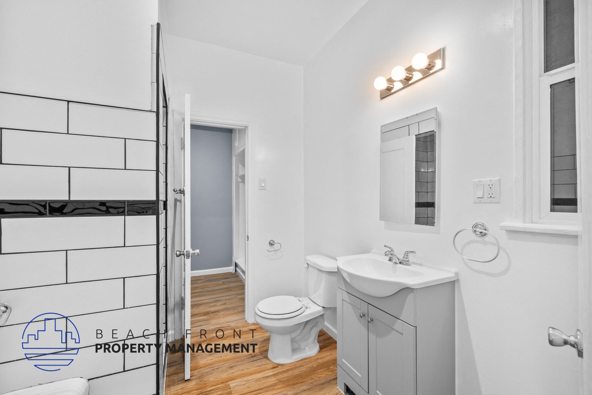 a bathroom with a toilet and a sink and a shower,a bathroom with a toilet and a sink and a shower