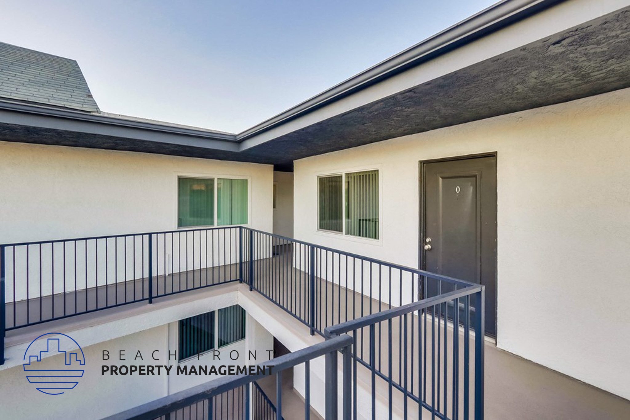 a view of a balcony of a building with a door