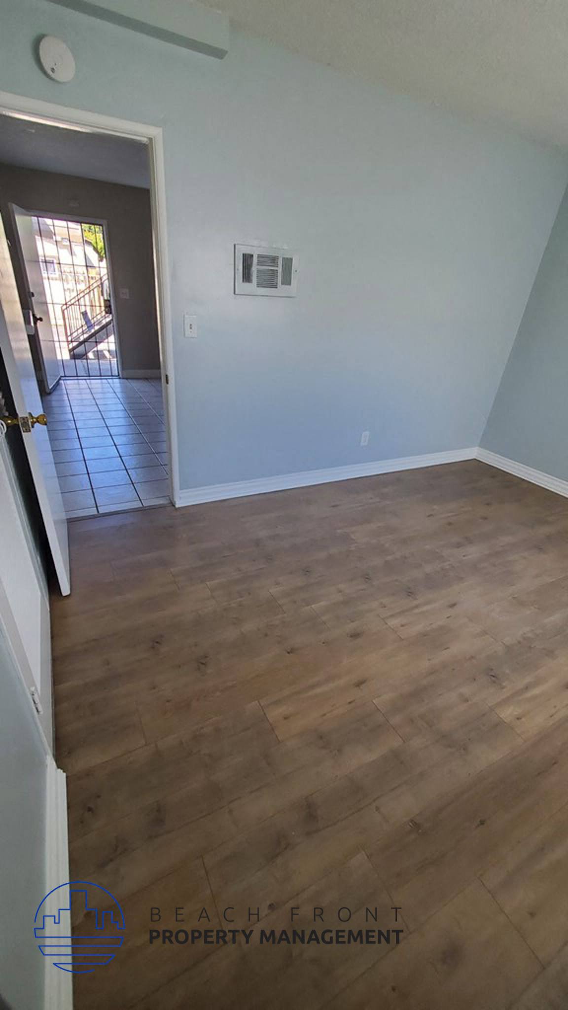 the living room is clean and ready for us to move in