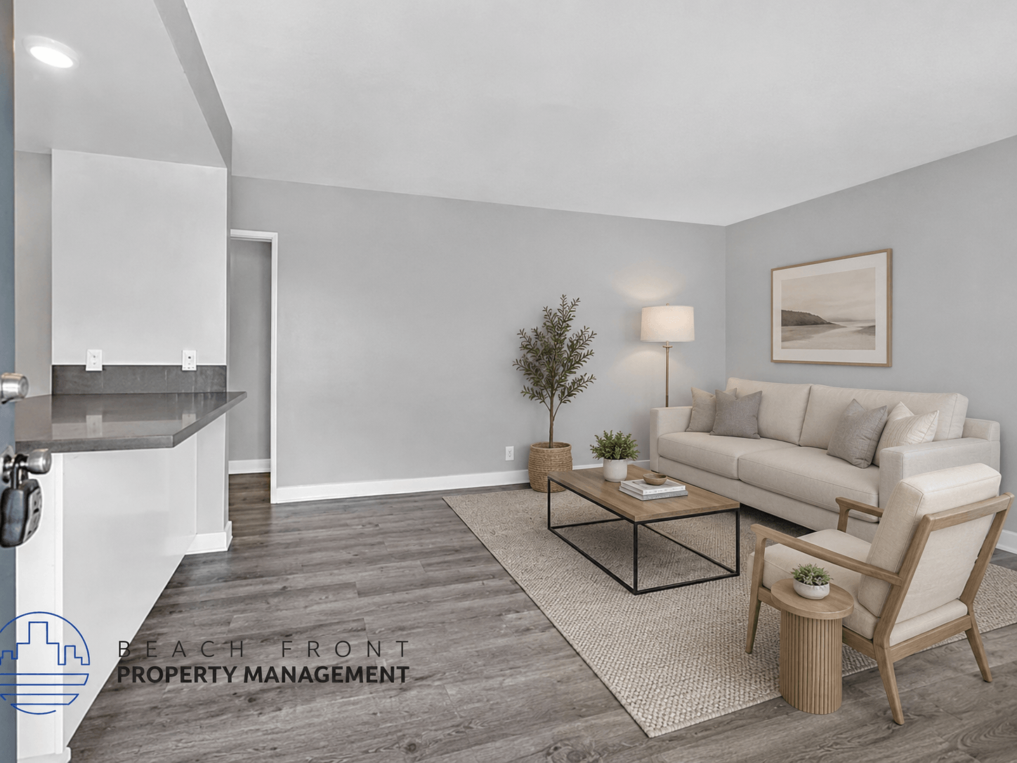 A living room with a couch, chair, and coffee table.