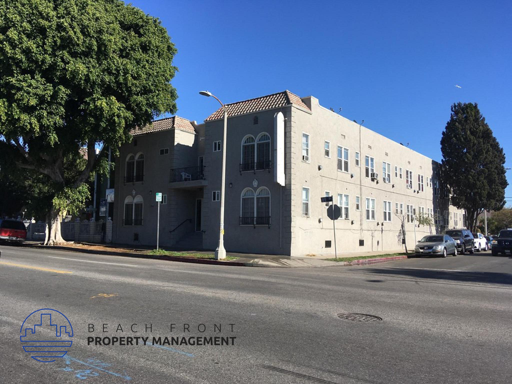 a large building on the corner of a street