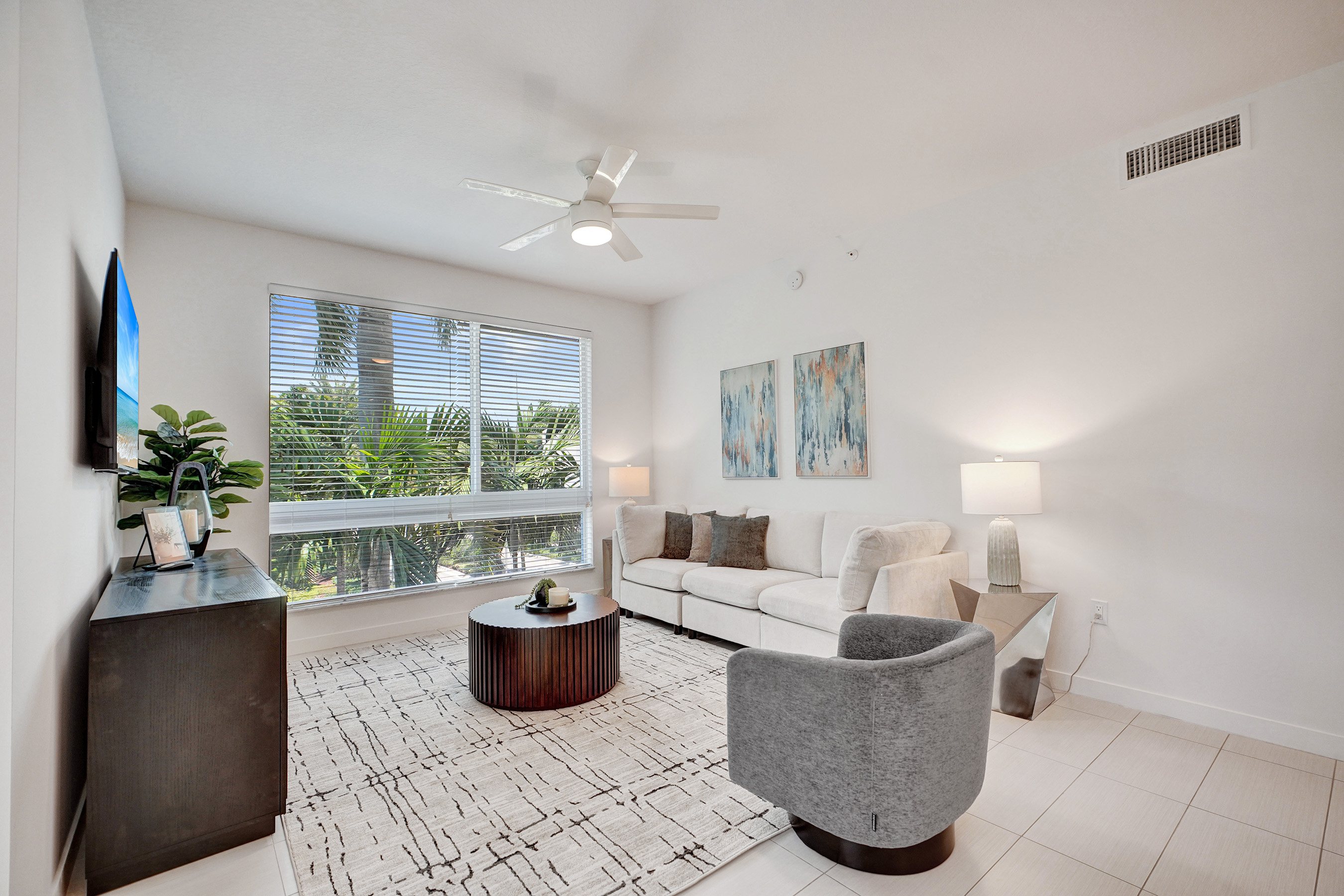 Furnished living room at 10X Boca Raton