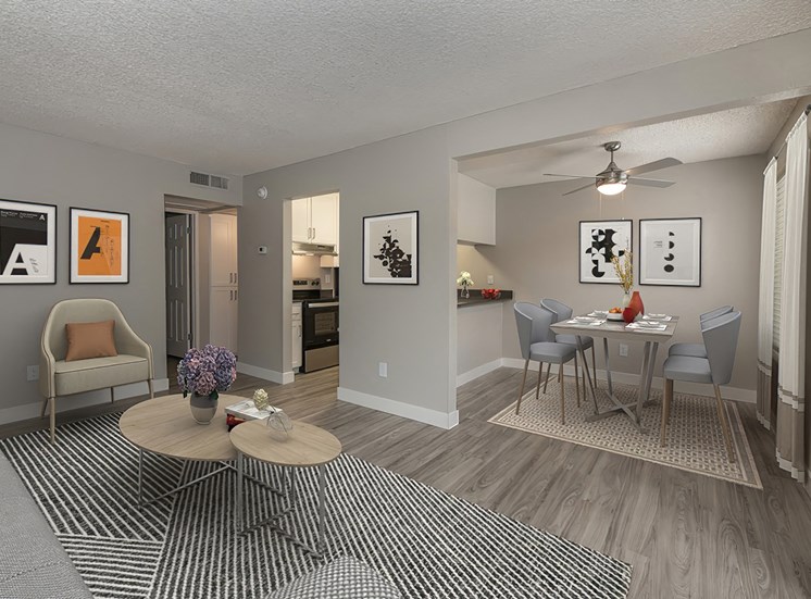 Apartments for Rent Rocklin CA - The Everette - Living Room with Wood-Style Flooring, Grey Walls, and Sliding Glass Patio Doors