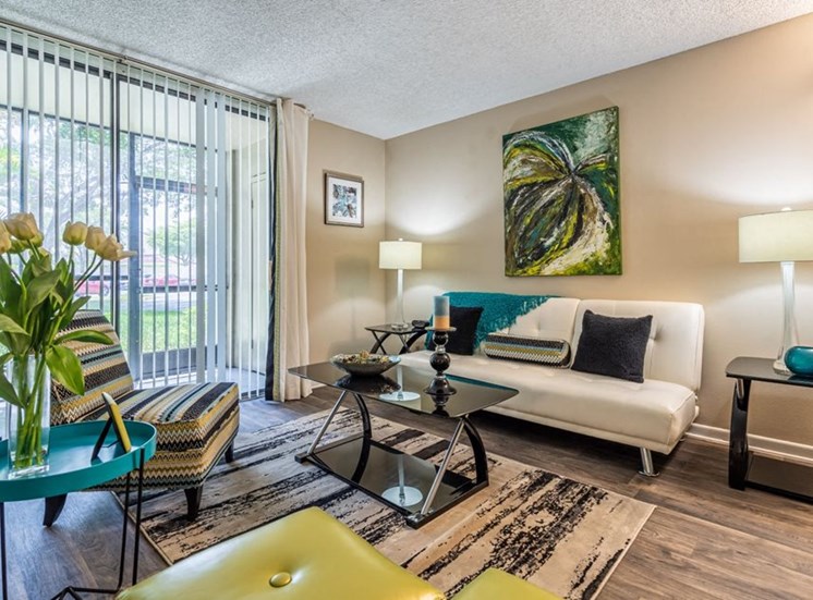 Pet Friendly Apartments in North Miami FL-Spacious Living Room With Modern Hardwood Floors and Large Sliding Doors