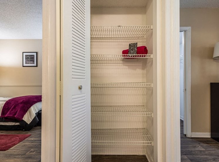 Closet with shelves l Horizons North Apartments in Miami, Fl