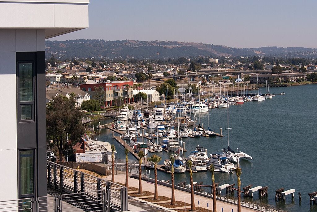 water view clubhouse seating l Orion Apartments in Oakland