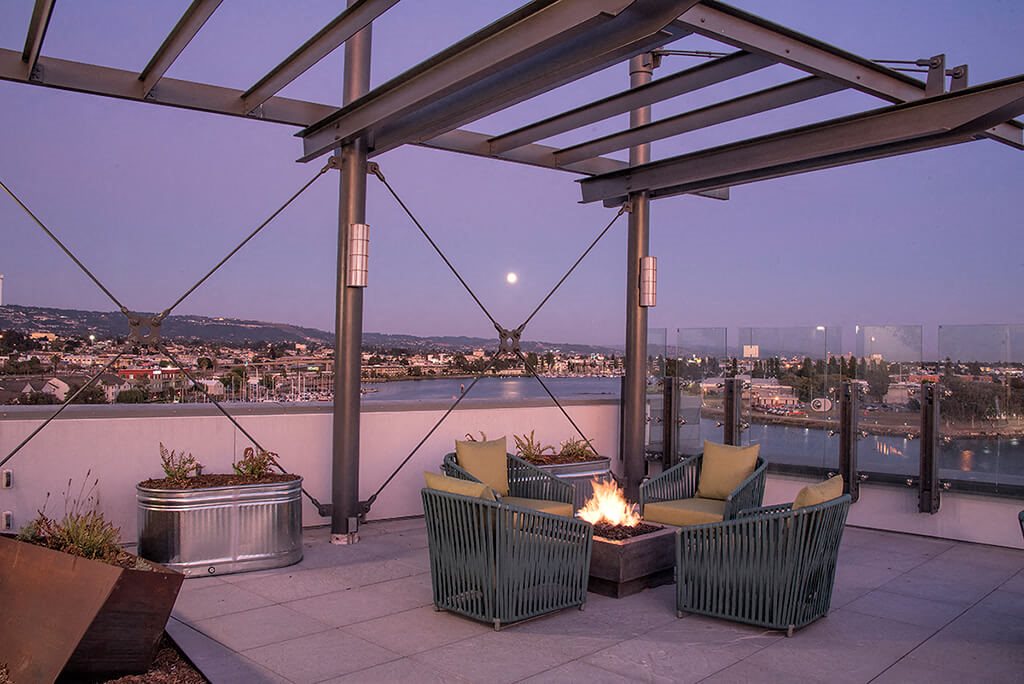 Rooftop seating with firepit l Orion Apartments in Oakland