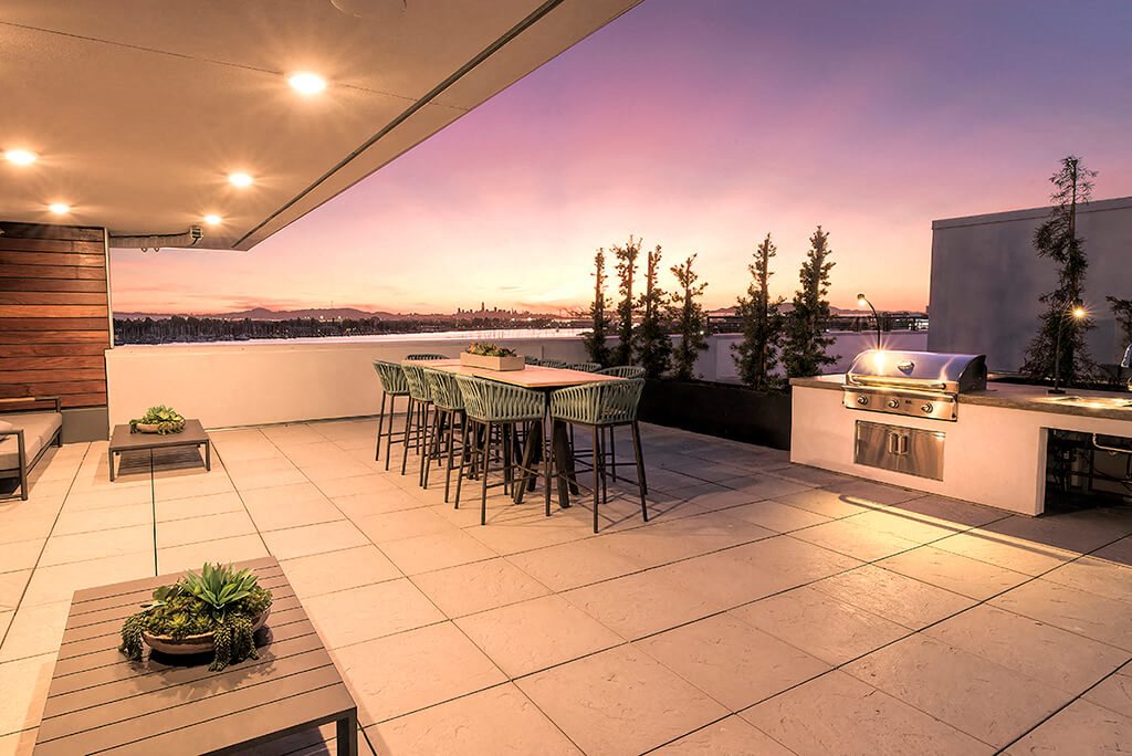 Rooftop seating by BBQ l Orion Apartments in Oakland