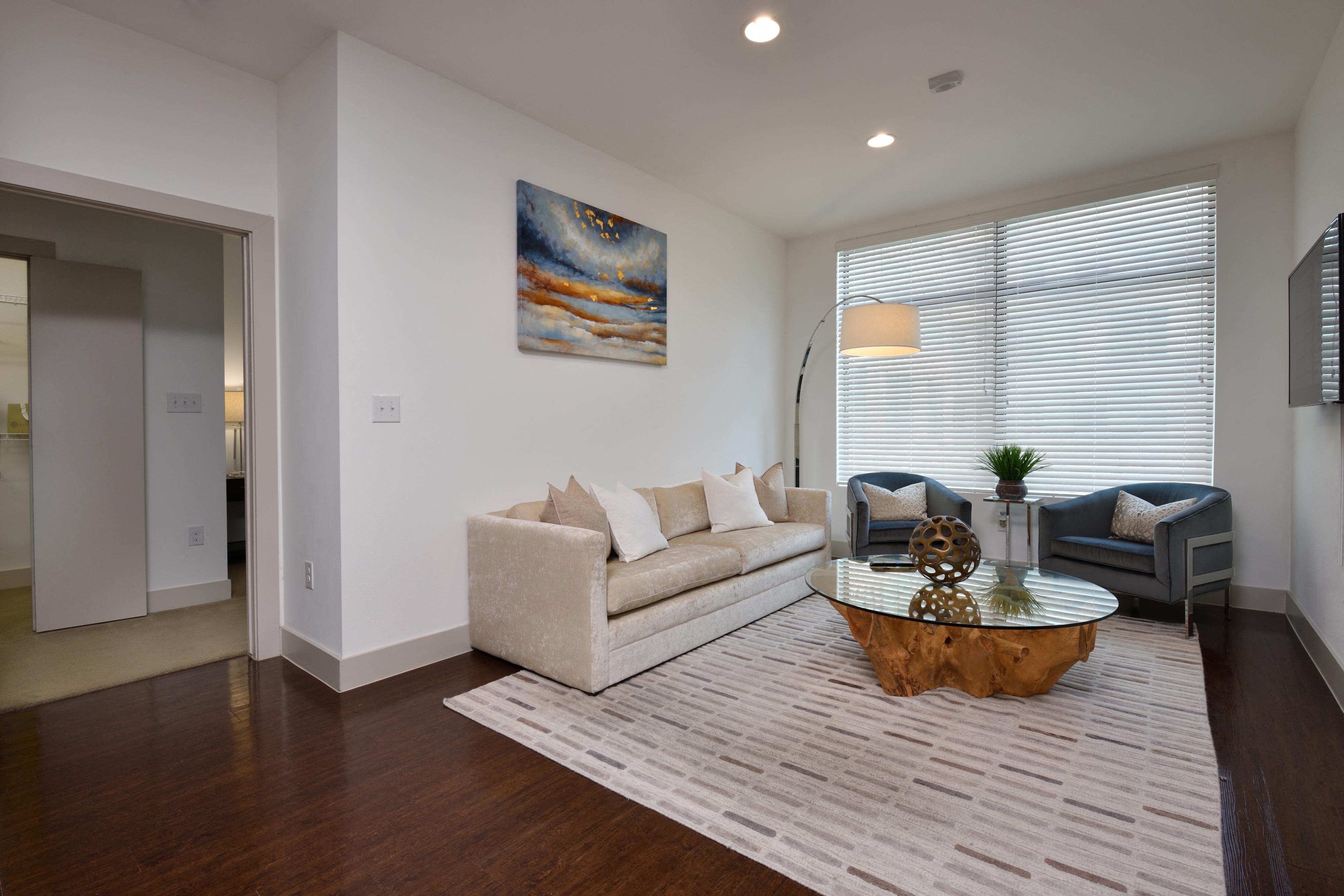 Living room interior at 100 Park  hardwood floors, contemporary furnishings, natural light