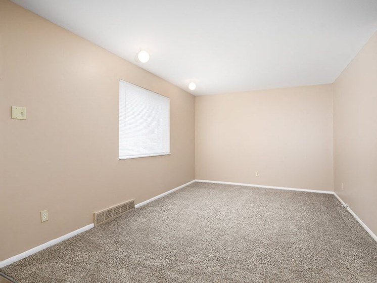 carpeted bedrooms at Emerald Crossing Apartments
