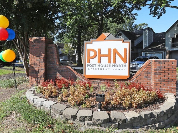 Welcome sign for Post House North Apartments
