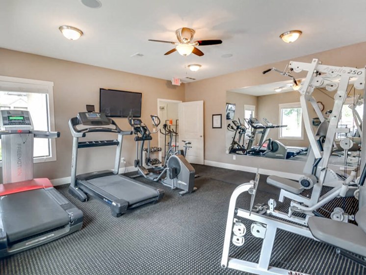 fitness center at The Hill's Apartments