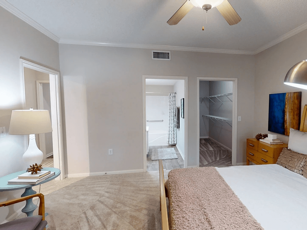 bedroom with a walk in closet