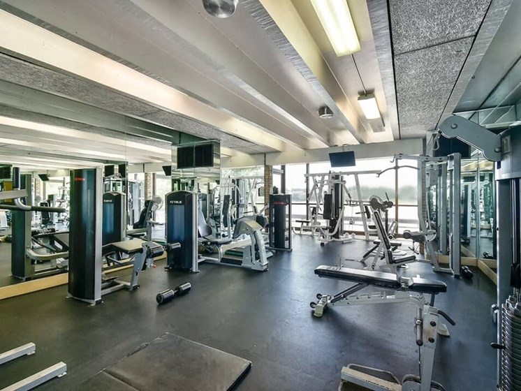 fitness center at apartment community