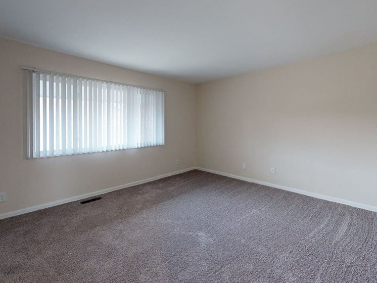 large room with window in apartment