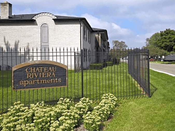 Outside sign for chateau Riviera Apartments