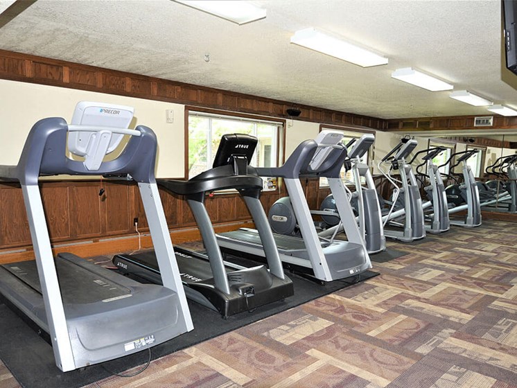 cardio equipment at Northwoods Apartments gym
