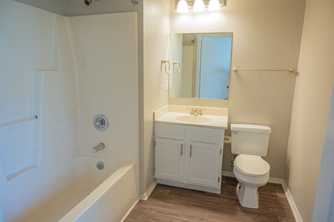 Spacious bathroom in your home at Deerbrook Apartments in Wilmington, NC 28405