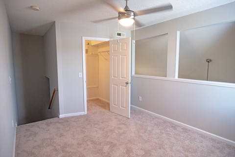 Spacious rooms with overhead ceiling fans and lighting at Deerbrook Apartment Homes in Wilmington, NC 28405