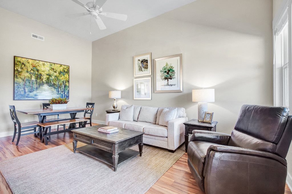 Wilmington NC Apartments - Open Space Living Room With Hardwood Floors and Stylish Interior