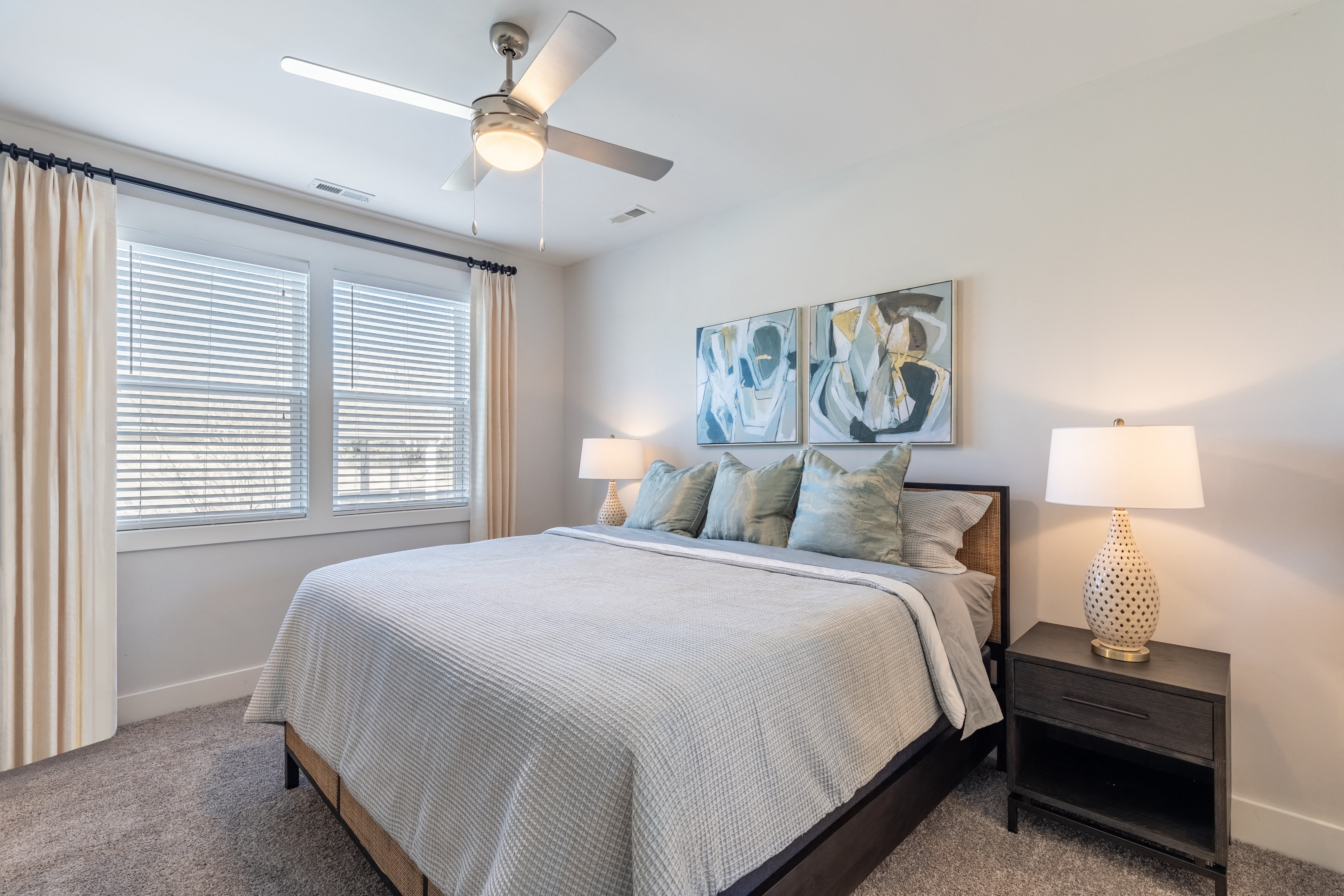 Luxury Three Bedroom Townhomes in Wilmington NC - Myrtle Landing - Bedroom with Plush Carpeting and a Ceiling Fan